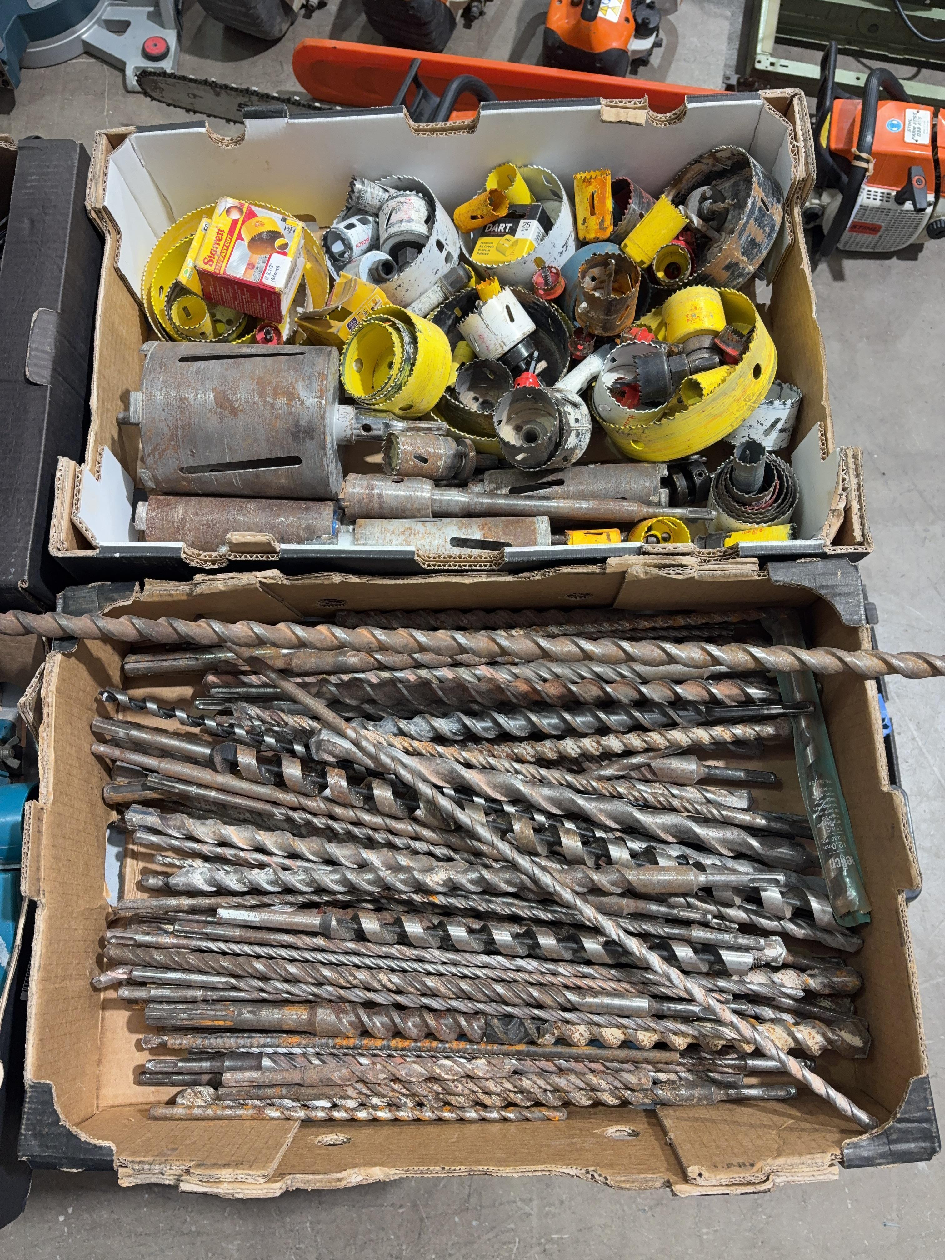 A box of various hole cutters and a box of various heavy duty drill bits - photo 1