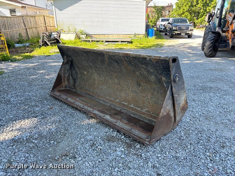 CNH TLB Four-In-One Backhoe Bucket