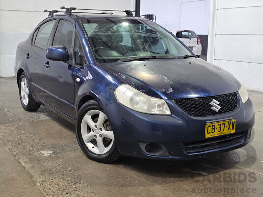 02/2009 Suzuki SX4 GY 4D Sedan Deep Sea Blue Metallic 2.0L - photo 1