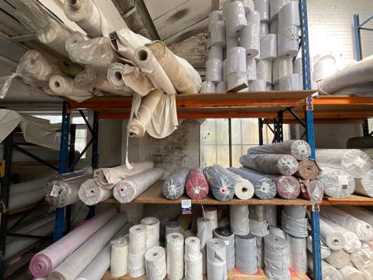 Approx 32 Rolls Various Fabric in Bay of Racking