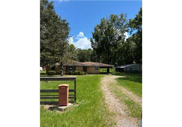 HUD Home — 16211 Highway 105, Cleveland, TX 77327