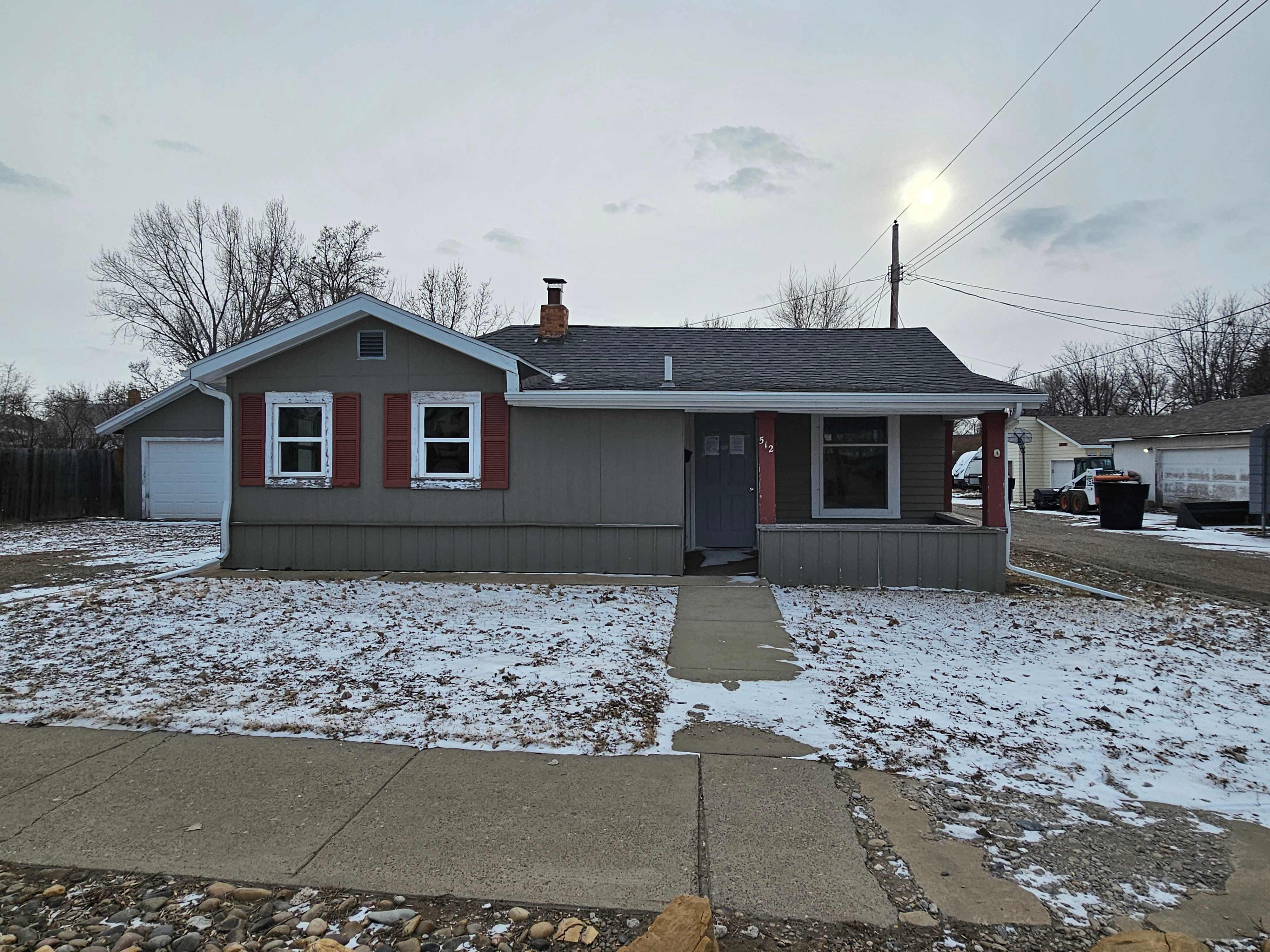 HUD Home — 512 E Barry St, Glendive, MT 59330 - photo 1