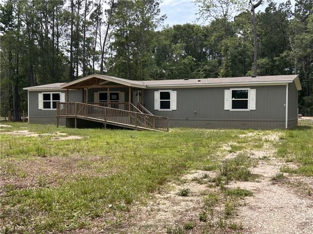 HUD Home — 534 County Road 3891 S, Cleveland, TX 77328 - photo 1