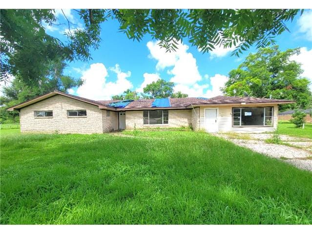 HUD Home — 419 Lee Ave, Jones Creek, TX 77541 - photo 1