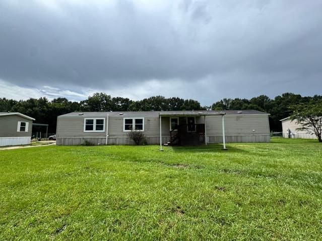 HUD Home — 207 Arnaudville Rd, Carencro, LA 70520 - photo 1