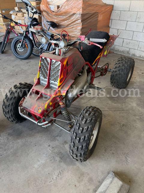 Red quad motorcycle.