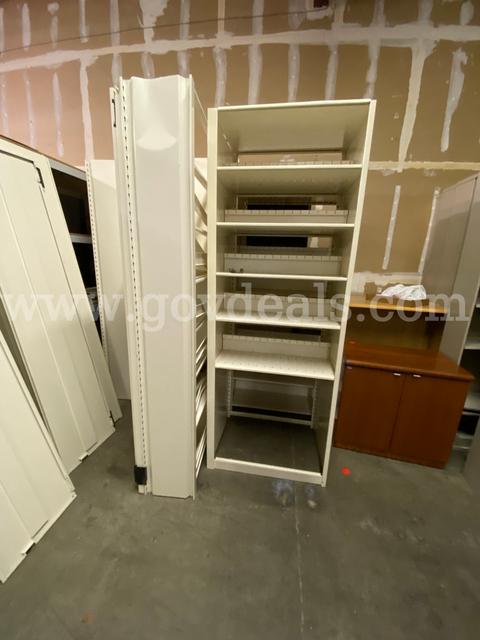 (5) Assembled Metal Shelving Units and Lot of Unassembled Shelving Unit Pieces