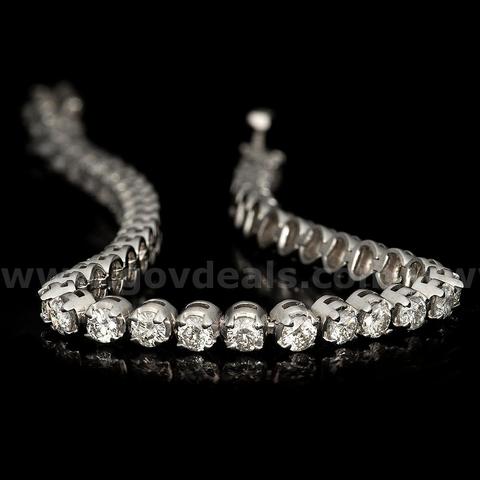 11.50 CT Ladies Tennis Bracelet. APP $75,390.