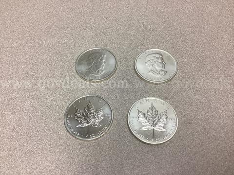 4 Troy ounces of 999.9 Fine Silver ( 4 coins )