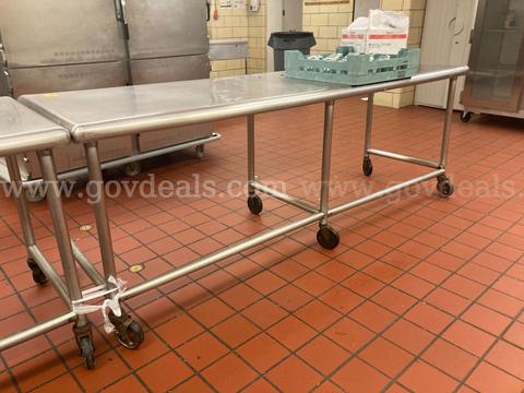 Lot of 4 stainless steel tables - 8ft - each on wheels
